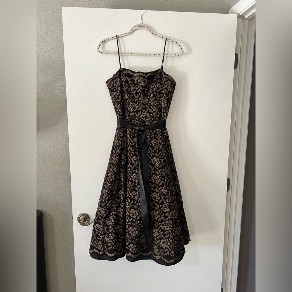 Betsy & Adam Black and Gold Lace Midi Dress. Size 10
